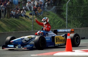 michael-schumacher-giving-a-lift-to-jean-alesi-after-alesis-first-and-only-f1-win-1995-canadian-gp-1200x778-imgur-copie